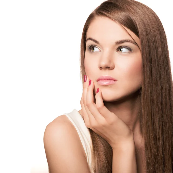 Cute young woman with long healthy brown hair holding a hand at — Stock Photo, Image