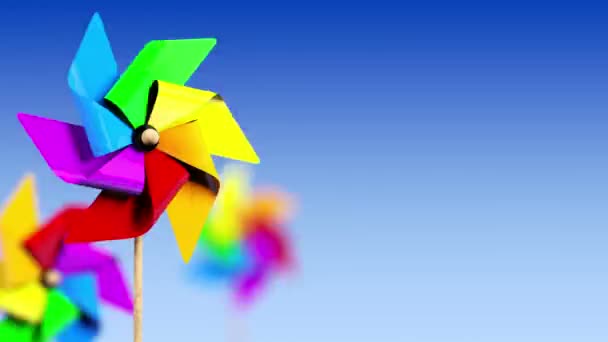 Pinwheel giratorio coloreado en el viento — Vídeo de stock