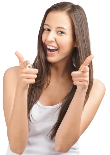 Happy casual girl showing thumbs up and pointing — Stock Photo, Image