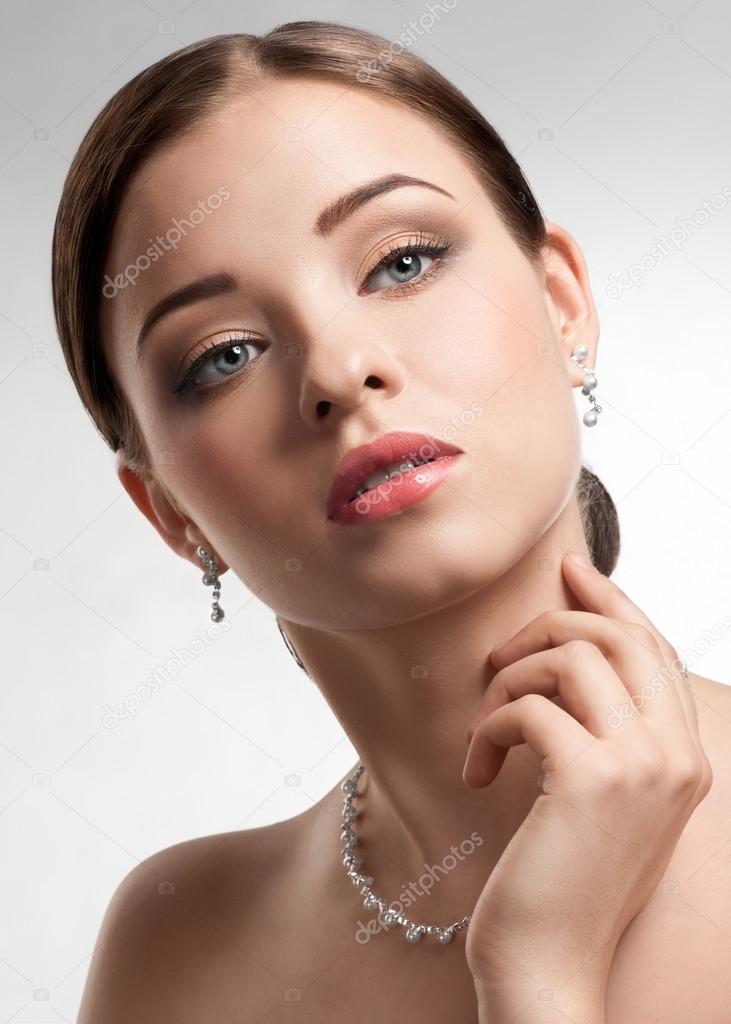 Beautiful woman with pearl necklace