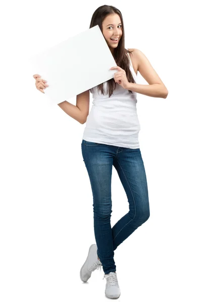 Casual menina segurando uma placa em branco — Fotografia de Stock