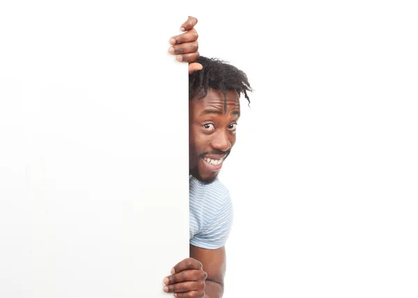 Hombre alegre con letrero en blanco — Foto de Stock