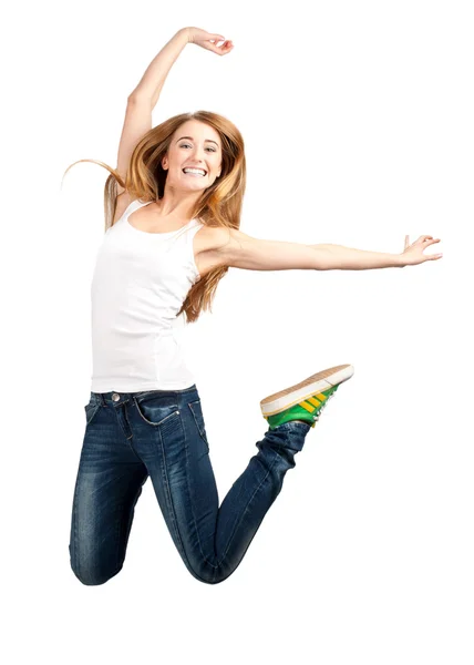 Gelukkig jonge vrouw springen in de lucht — Stockfoto