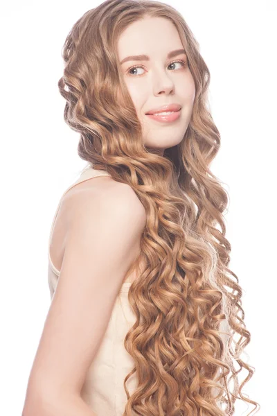 Frau mit lockigen langen Haaren — Stockfoto