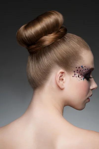 Woman with makeup and hairstyle — Stock Photo, Image