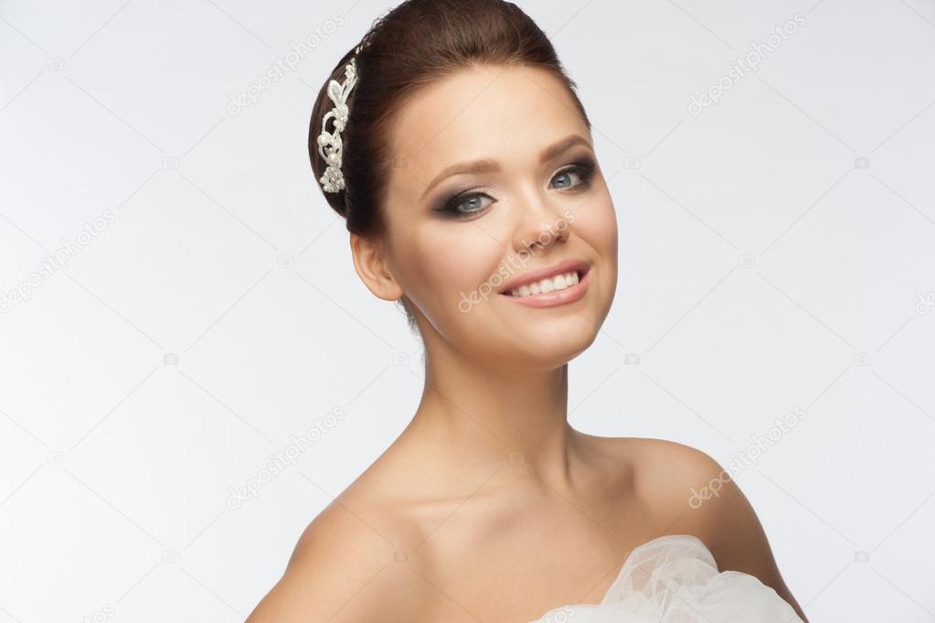 Girl with bridal hairstyle and makeup