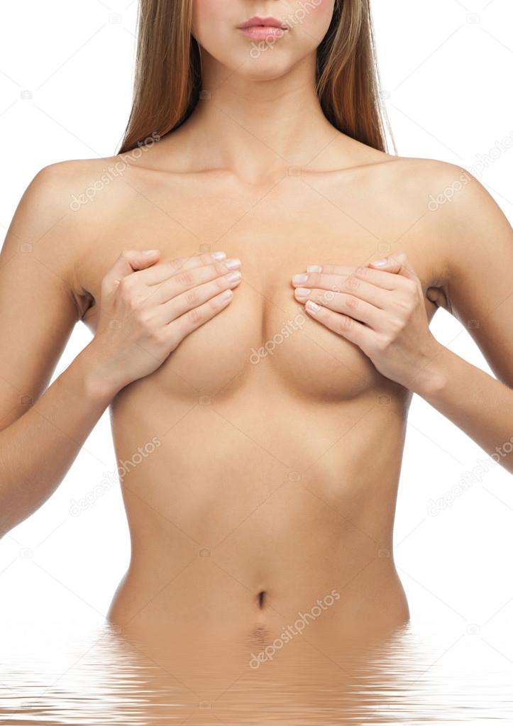 Woman covering her breast
