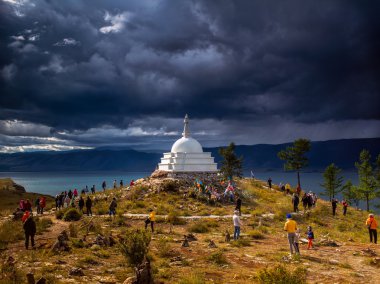 Religious building on the island of Lake Baikal clipart
