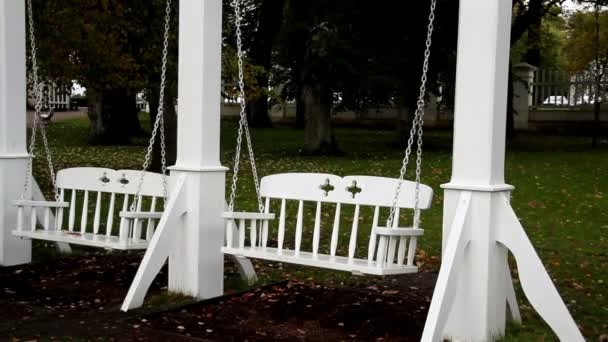 Two white bench swing — Stock Video