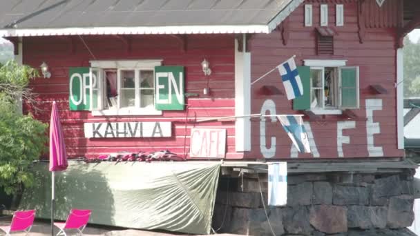 Lots of Finland flags waving on a house FS700 Odyssey 7Q — Stock Video