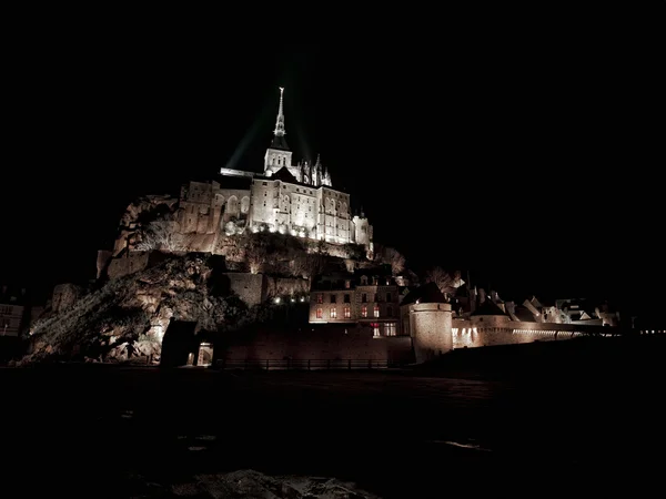 Mont St Michel de noche Imagen de archivo