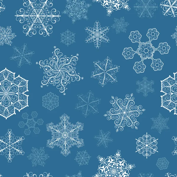 Рождественский бесшовный узор с большими и маленькими снежинками — стоковый вектор