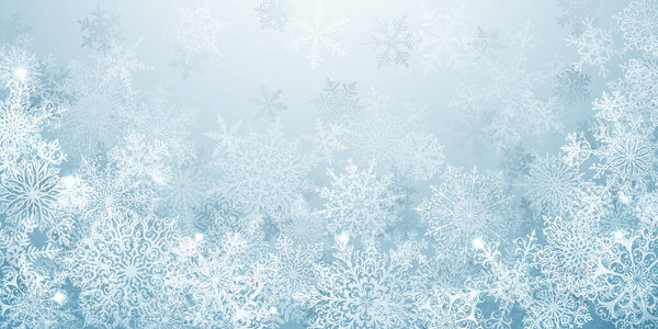 Christmas background of big complex snowflakes in light blue colors