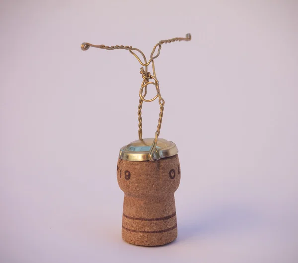 Puppet in iron wire on cork plug — Stock Photo, Image