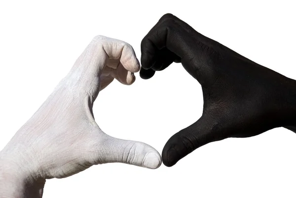Heart formed by black and white hand — Stock Photo, Image