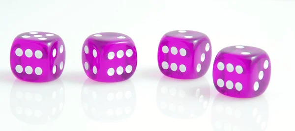 Four purple dice — Stock Photo, Image