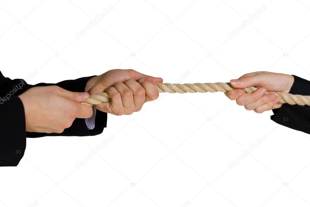 Tug of war; hands pulling a rope; business background