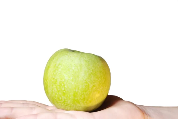 Рука тримає яблуко — стокове фото
