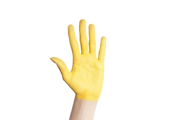 Una mano amarilla — Foto de Stock