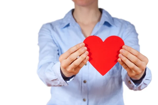 Persona sosteniendo un corazón — Foto de Stock