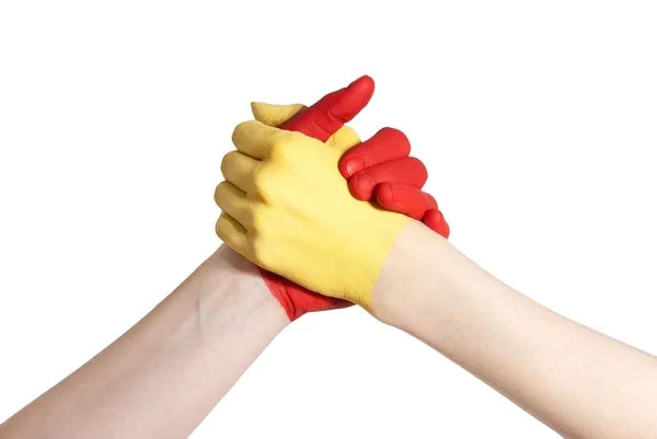 Yellow and red hand in competition — Stock Photo, Image