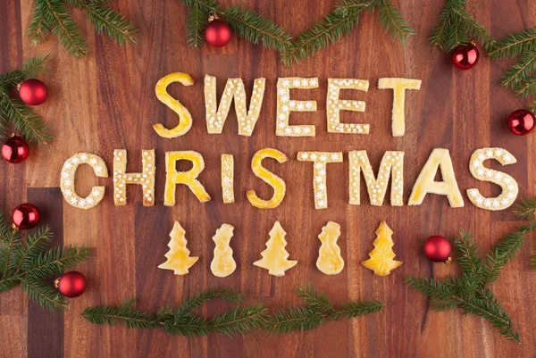 Dulce navidad con dulces como decoración — Foto de Stock