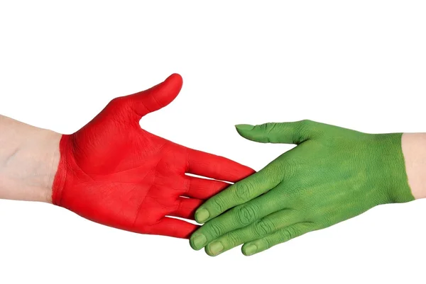 Red and green handshake — Stock Photo, Image