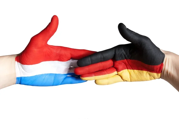 Aperto de mão entre a Alemanha e os Países Baixos — Fotografia de Stock