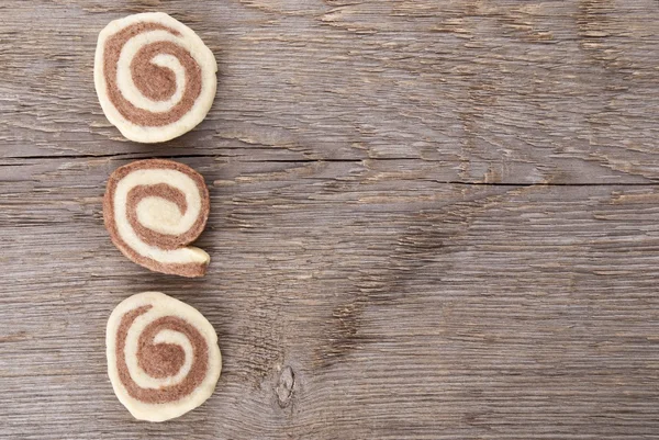 Three cookies on wood — Stock Photo, Image