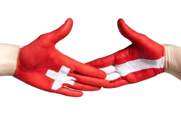Швейцарско-австрийское рукопожатие — стоковое фото