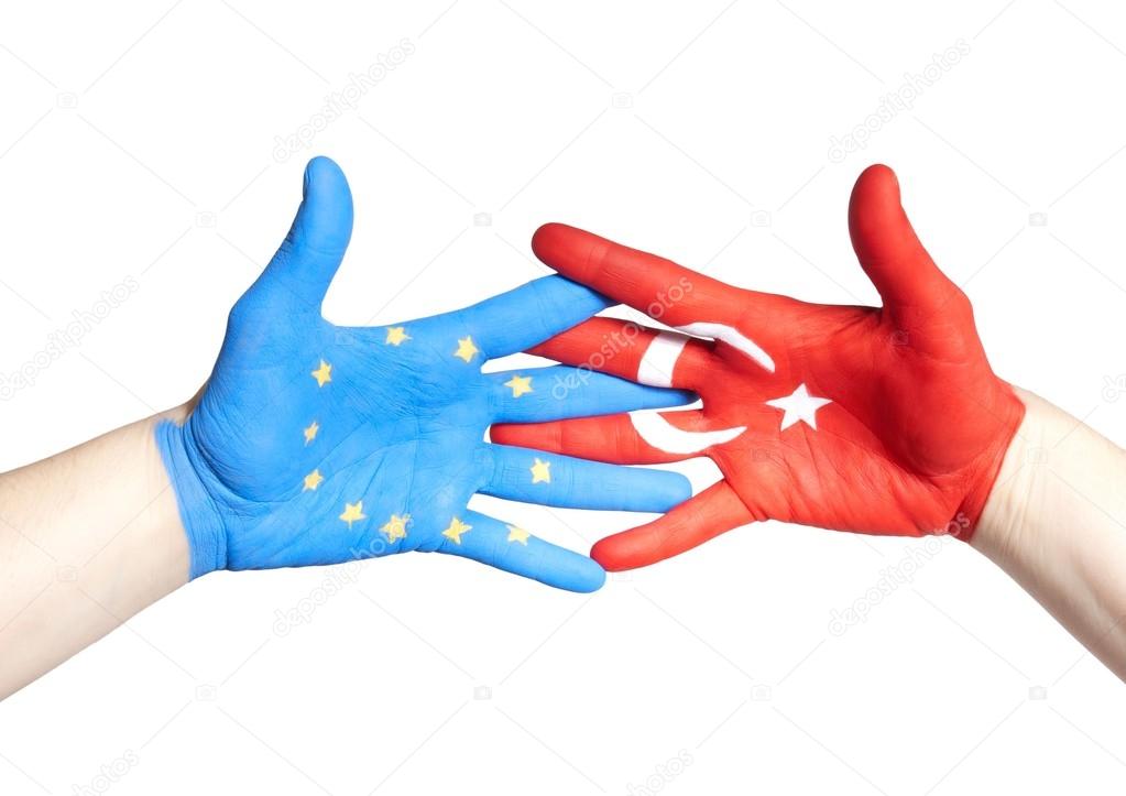 turkey and european hands holding