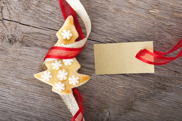 Etichetta dorata con spazio per copiare e biscotti natalizi — Foto Stock