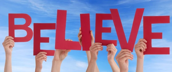 Hands Holding Believe in Front of the Sky — Stock Photo, Image