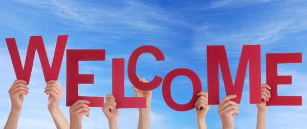 Hands Holding Welcome in Front of the Sky — Stock Photo, Image