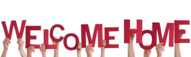 Many Hands Holding a Welcome Home clipart