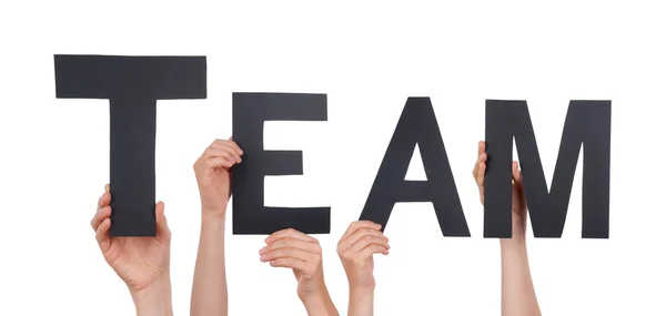 People Holding a Black Team — Stock Photo, Image
