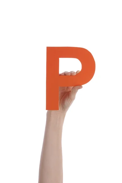 Χέρι που κρατά το p — Φωτογραφία Αρχείου