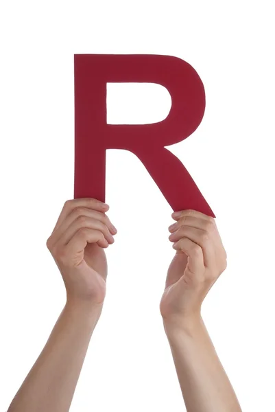 Hand Holds R — Stock Photo, Image