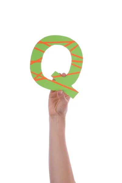 Person Holding Q — Stock Photo, Image