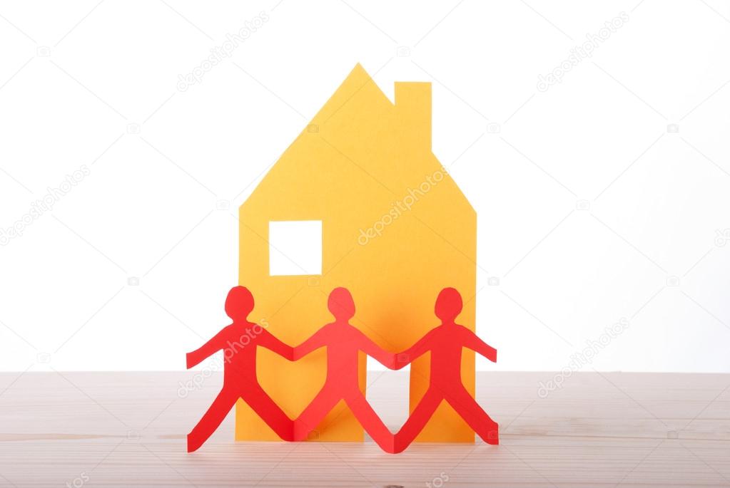 People in front of a House