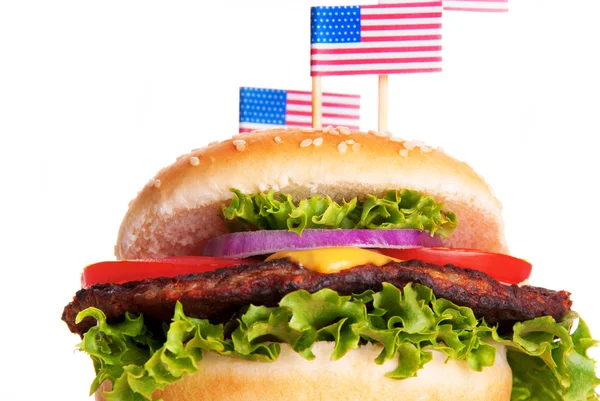 Hamburger avec des drapeaux américains — Photo