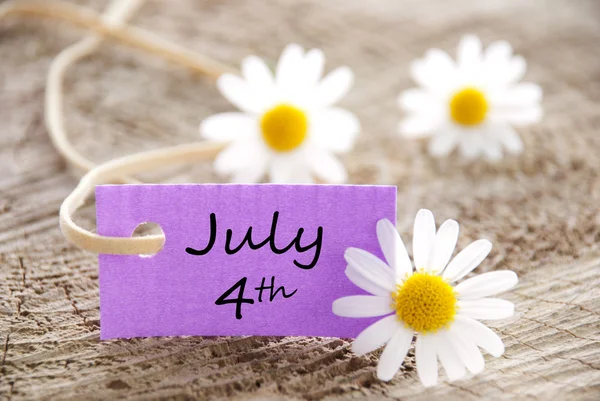 Etiqueta púrpura con 4 de julio —  Fotos de Stock