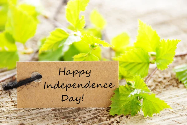Etichetta con foglie e felice giorno dell'indipendenza — Foto Stock