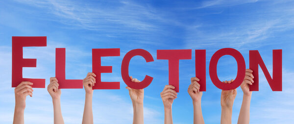 Люди, проводящие выборы в небе
