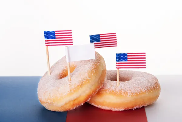 Donuts com bandeiras e cópia de espaço Banner — Fotografia de Stock