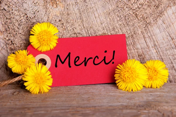 Tag rosso con Merci — Foto Stock