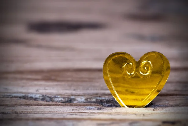 Golden Heart on Wood — Stock Photo, Image