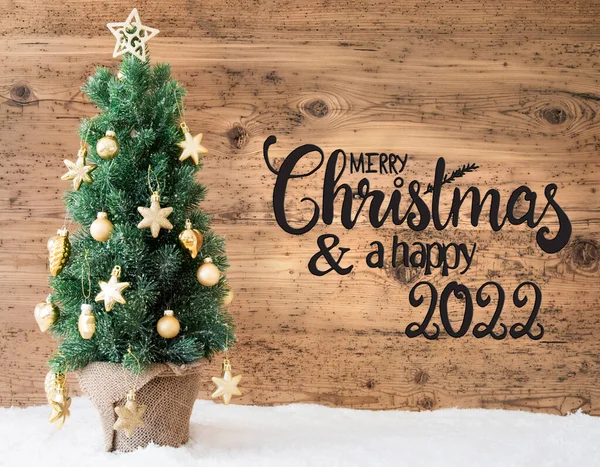 Albero di Natale, Sfondo in legno, Neve, Buon Natale e un felice 2022 — Foto Stock