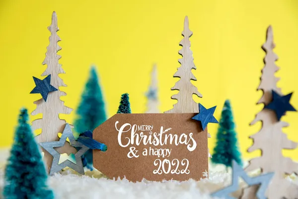 Noel Ağaçları, Kar, Sarı Arkaplan, Etiket, Mutlu Noeller ve Mutlu 2022 — Stok fotoğraf