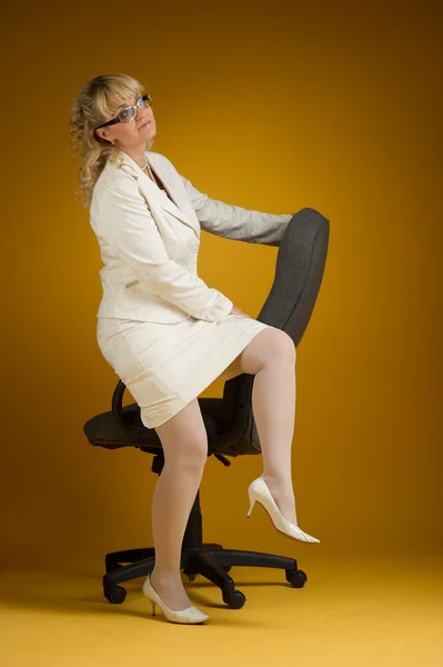 Business woman and chair — Stock Photo, Image